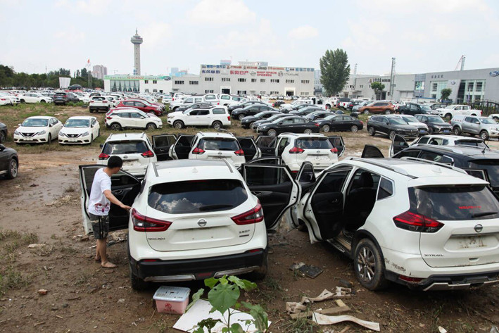 维修人员奇缺、高价回收已现 郑州暴雨后，泡水车会去哪儿？