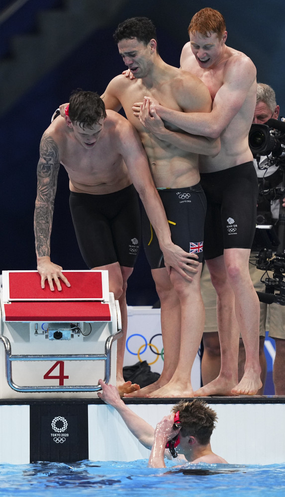 新华社记者 许畅 摄7月28日,英国队选手盖伊,迪恩,斯考特和理查兹(从