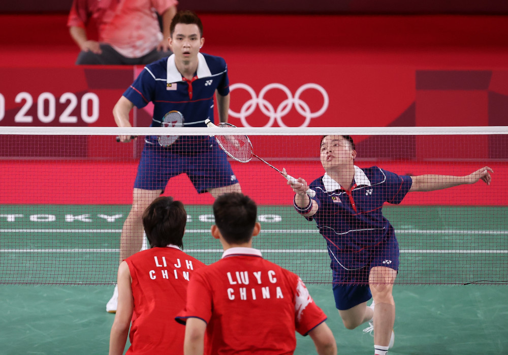 东京奥运会羽毛球男子图片