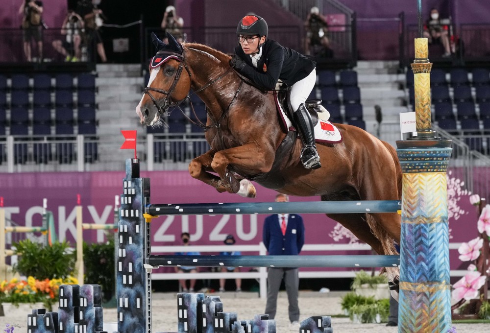 东京奥运会马术中国选手参加马术场地障碍赛