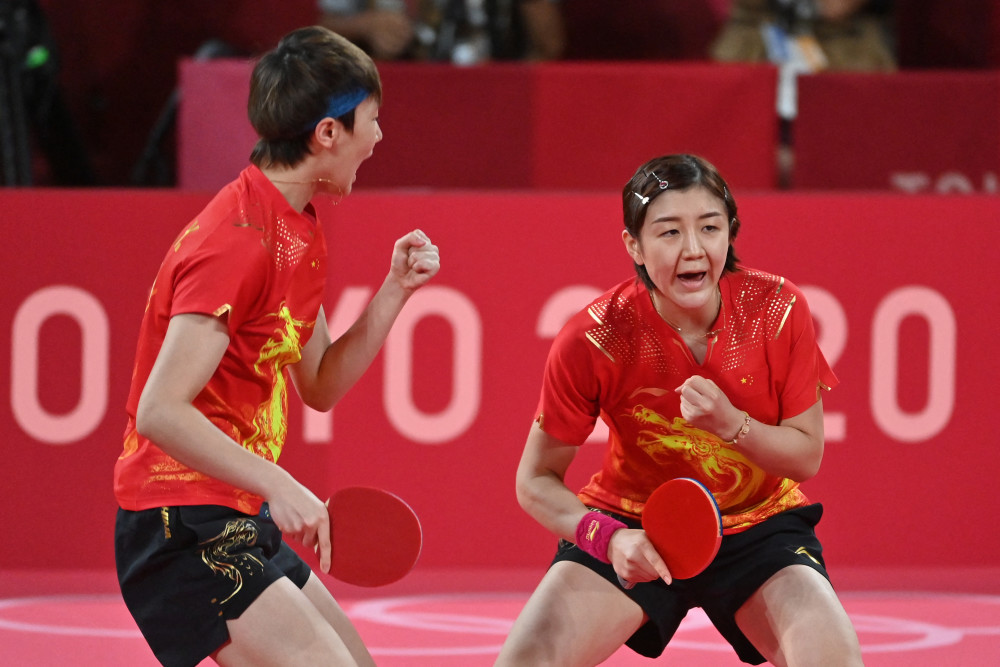 最后一页 东京奥运会乒乓球女团决赛在东京体育馆进行.