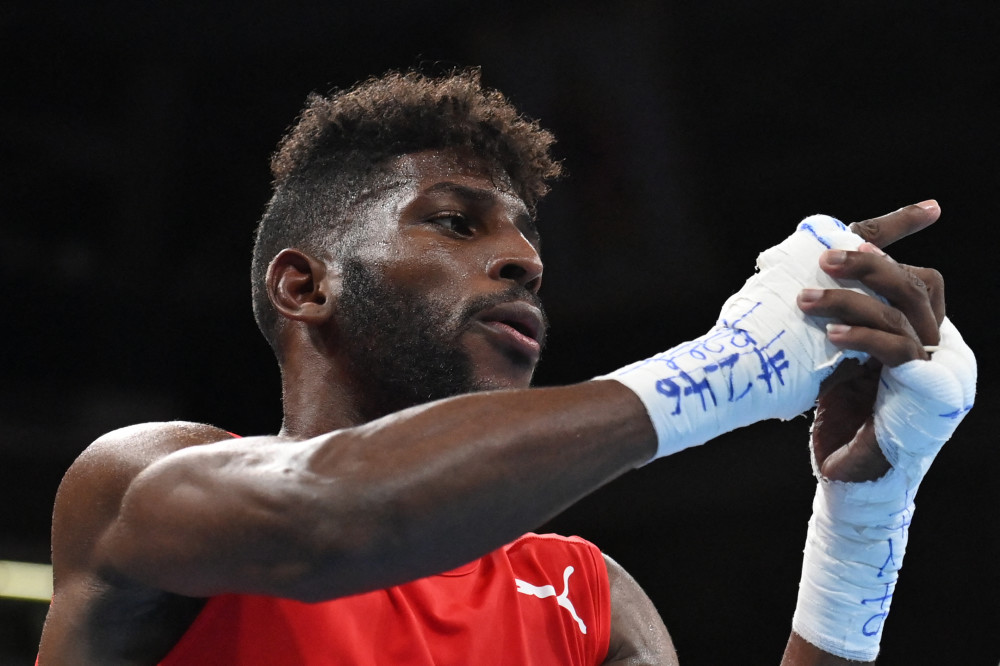 奥运金牌-拳击男子63公斤级决赛 古巴选手安迪-克鲁斯夺金_腾讯新闻