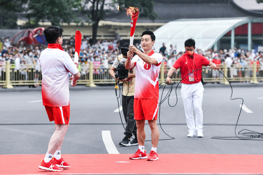 十四运会火炬传递图片图片