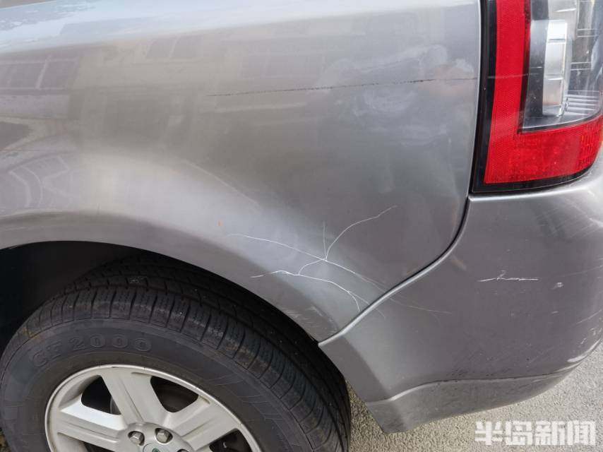 镇江路一小区10多辆车被划,谁下的黑手?_腾讯新闻