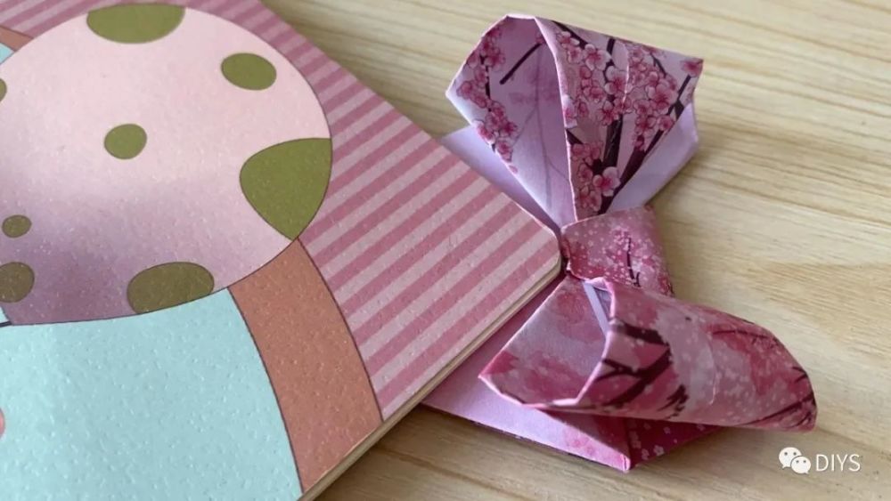 "手工折纸"漂亮的蝴蝶结书签!_腾讯新闻