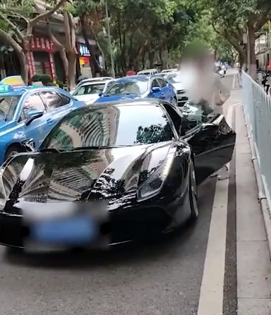 嚣张广东一法拉利女司机追尾前车却口出狂言我有关系弄死你