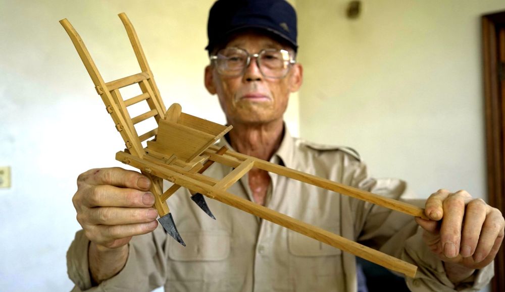 制作迷你农具唤醒乡愁记忆