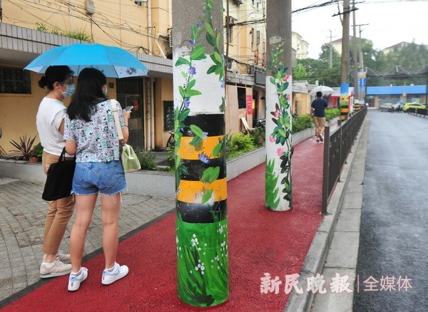 电线杆彩绘让小街颜值提升