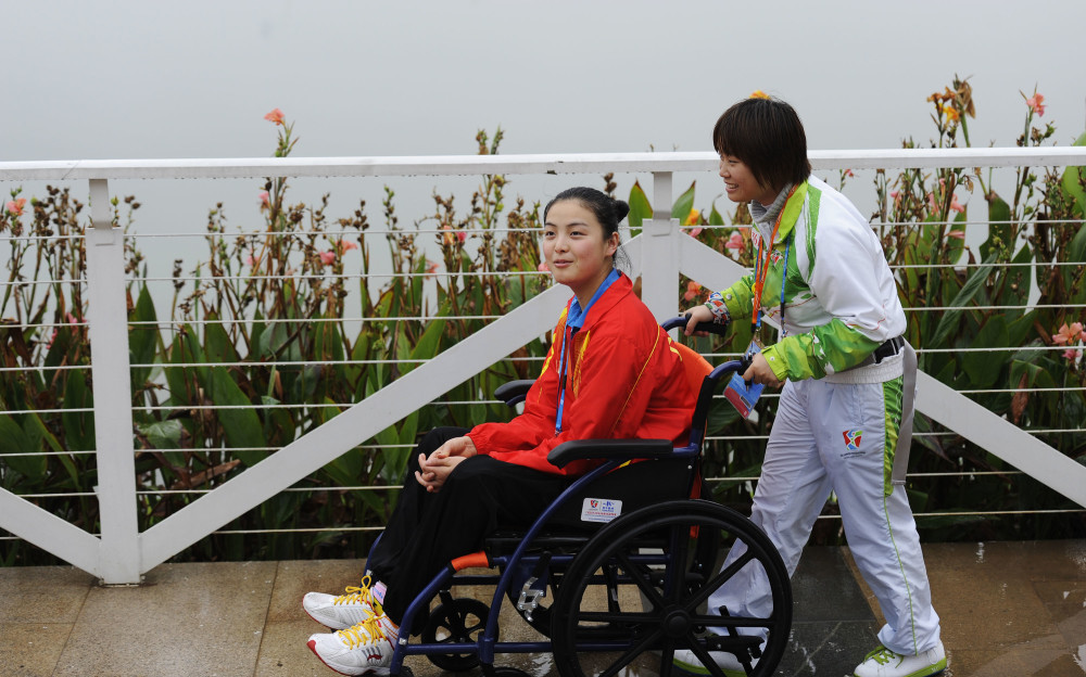 (东京残奥会·专题)唐雪梅:坐式排球点亮人生_腾讯新闻