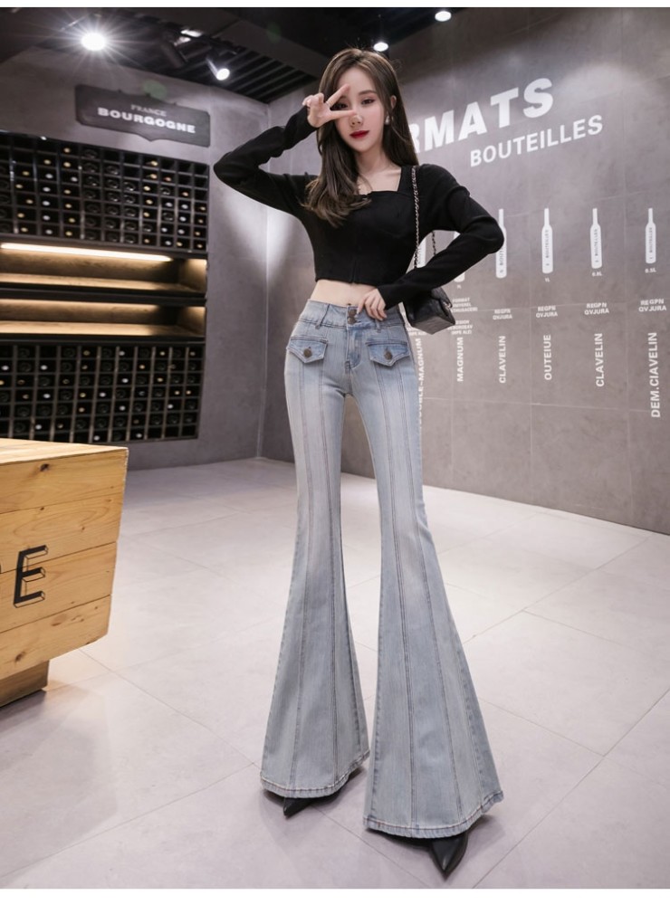 身材魁梧的美女短款上衣搭配喇叭牛仔裤更加展示成熟女人的魅力_腾讯