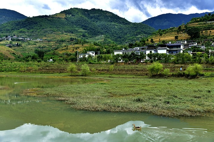 中国恒春之都,空气好环境美,物价低节奏慢,养老性价比高_腾讯新闻