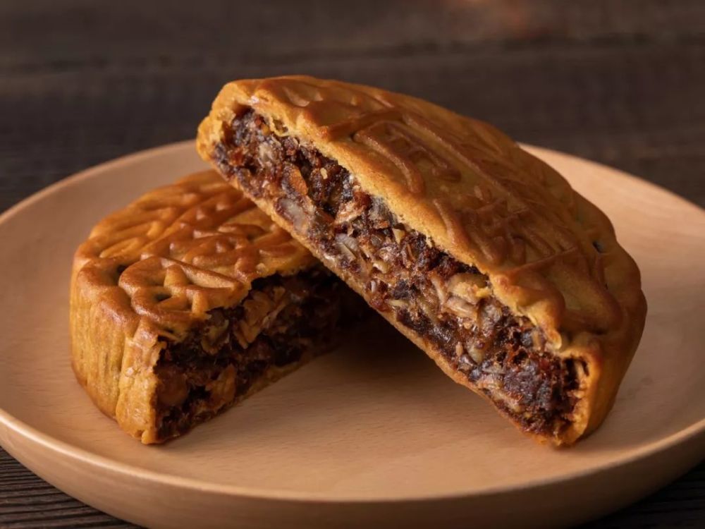 藤椒牛肉月饼梅干菜猪肉月饼腌笃鲜月饼云腿鸡枞月饼螺蛳粉月饼吃上面