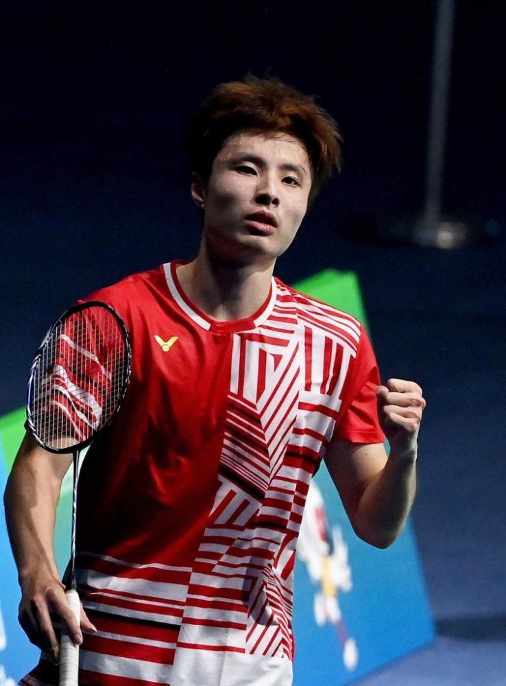 彭子洋 摄当日,在西安举行的第十四届全运会羽毛球男子单打决赛中