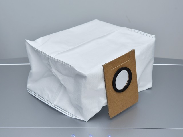 轻提尘袋右侧的纸板便可将无纺布尘袋取出,主体采用可隔离小至0.