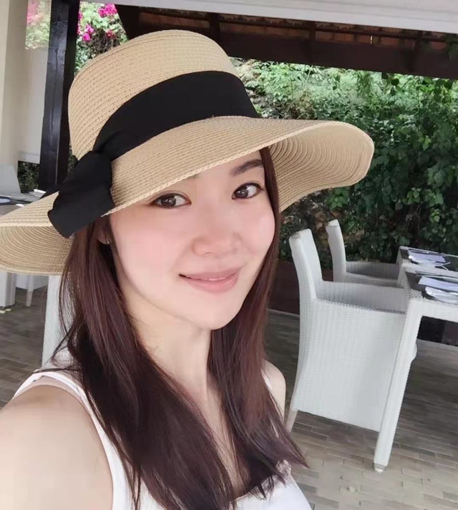 今年44岁的杨张新悦育有4个女儿,她在怀第四胎期间依然能夠"长胎不长