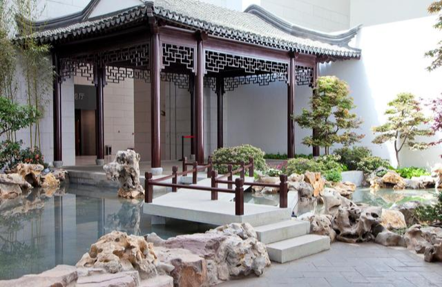 假山山石与建筑的结合形式二抱角镶隅及粉壁置石