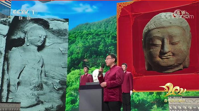 图为央视春晚播出的天龙山石窟第8窟北壁主尊佛首画面