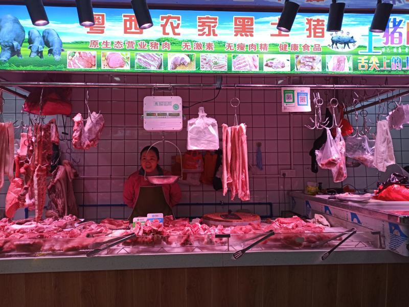 天河区东南肉菜市场一家猪肉档口 本轮"猪周期"何时可结束?