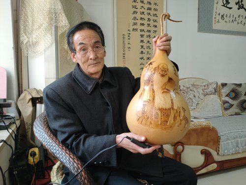 宜川这位农民的葫芦烙画上"卧虎藏龙"_腾讯新闻