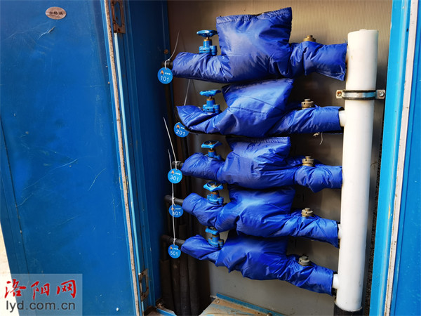 冬天水表也要穿衣盖被