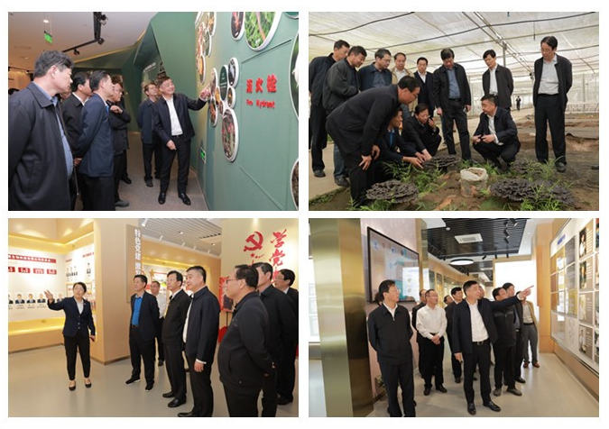 扶贫开发协会理事长李荣启一行,在南通开发区党工委书记张建华,副书记