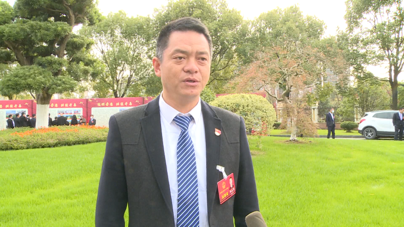 市人大代表 杨永智"我将把会议精神带回去,向群众做好宣传和传达,用我