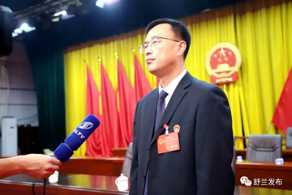 人大代表,莲花乡党委书记王伟刚刚闭幕的人代会上,政府工作报告系统