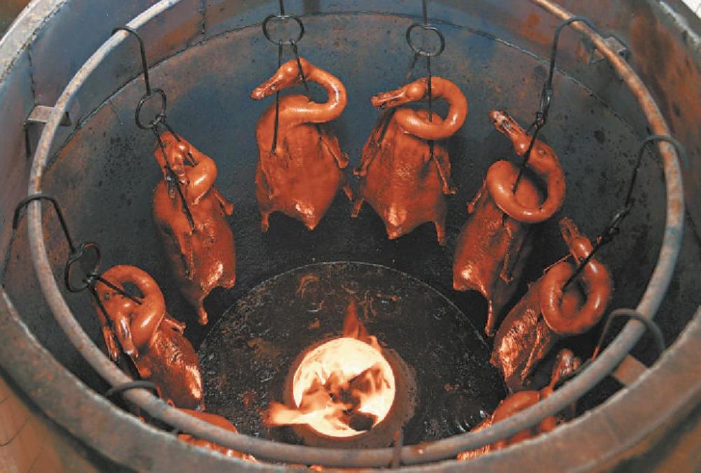 北烤鸭,南烧鹅,烤炉之中见分晓_腾讯新闻