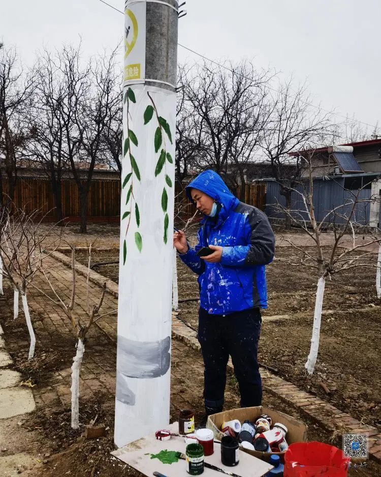 津南区小站镇南付营村墙面电线杆穿新衣美丽乡村刷新颜值