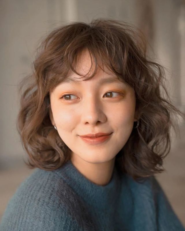 年底该烫头发了