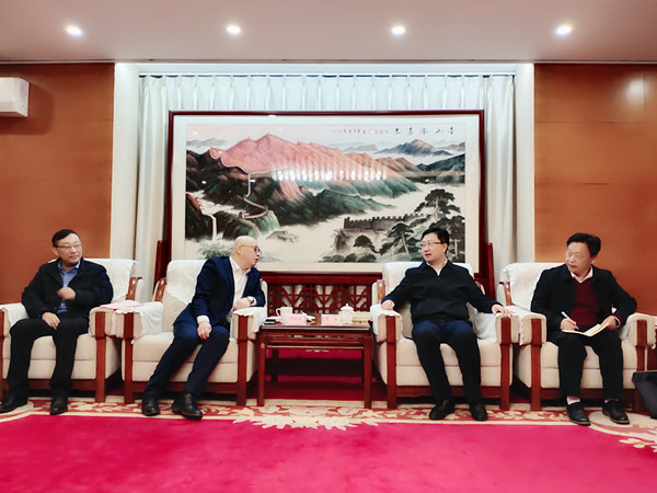 邢健民拜会南阳市委常委统战部长副市长范勇
