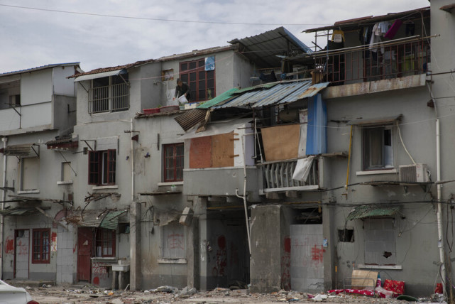 上海杨浦旧改收官,难忘艰辛:600万动迁款11人分,一户家庭67次调解