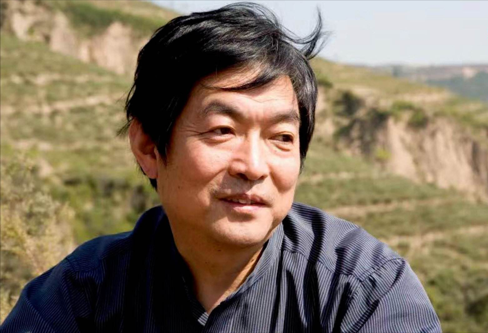 西安作协吴克敬,其父为生他亲手溺死俩女儿