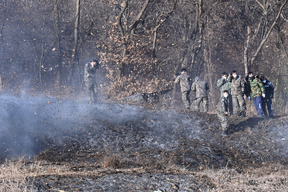 這是1月11日在韓國京畿道華城市拍攝的韓空軍f-5e戰鬥機墜毀現場.