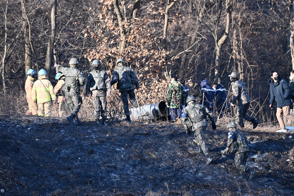 這是1月11日在韓國京畿道華城市拍攝的韓空軍f-5e戰鬥機墜毀現場.