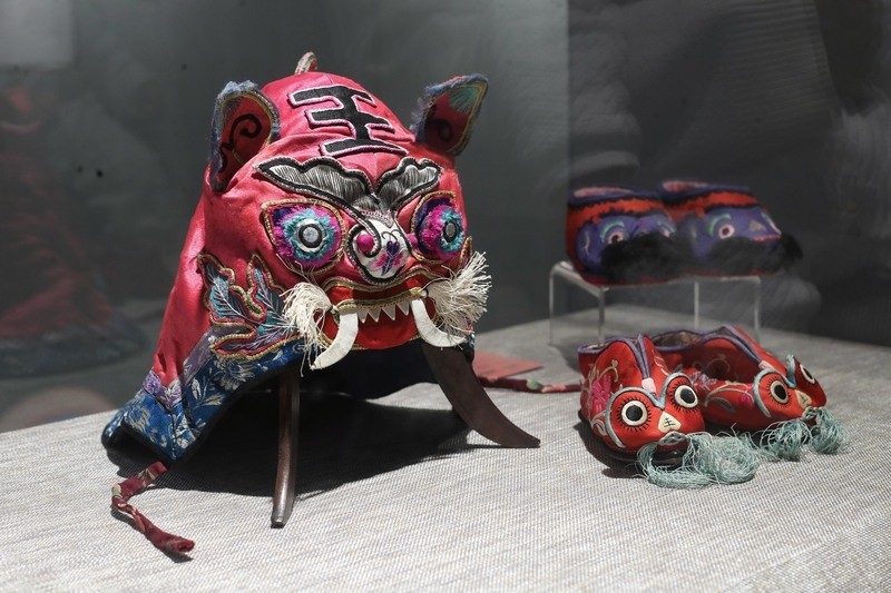 孩子为何戴虎头帽?"虎"字成语褒贬皆有之_腾讯新闻