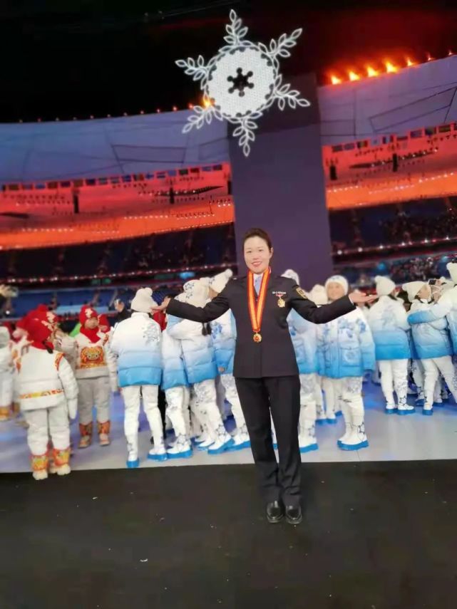 加油北京冬奥丨全国人社知识通周敏传递的是国旗更是使命