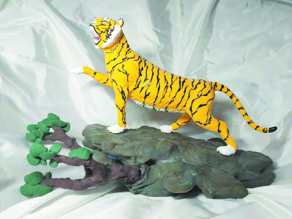 巧手捏面塑萌虎庆新春