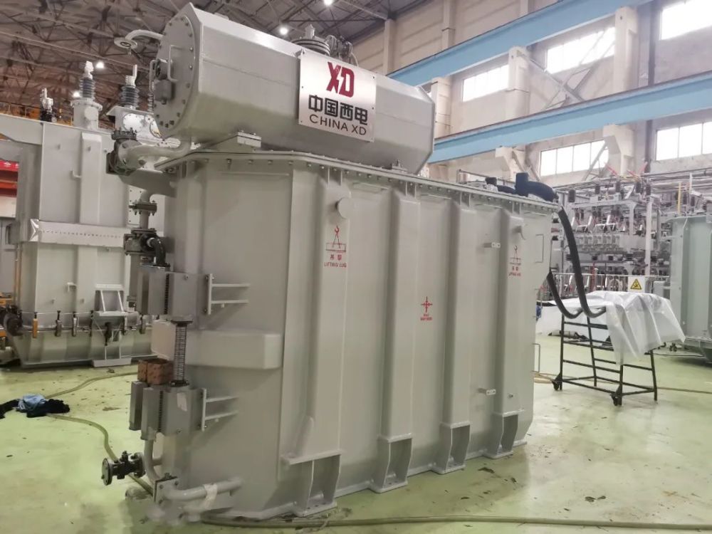 西变中特自主研制的首台srspf1210069海上风电塔筒变压器一次性通过突