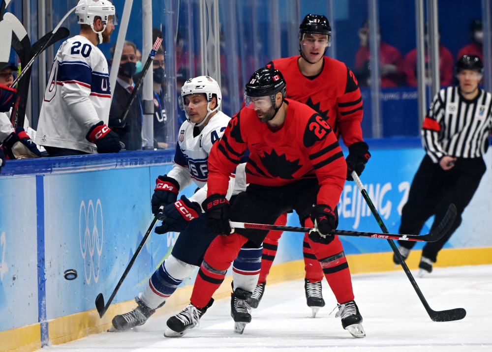 北京冬奥会冰球男子小组赛:美国队胜加拿大队