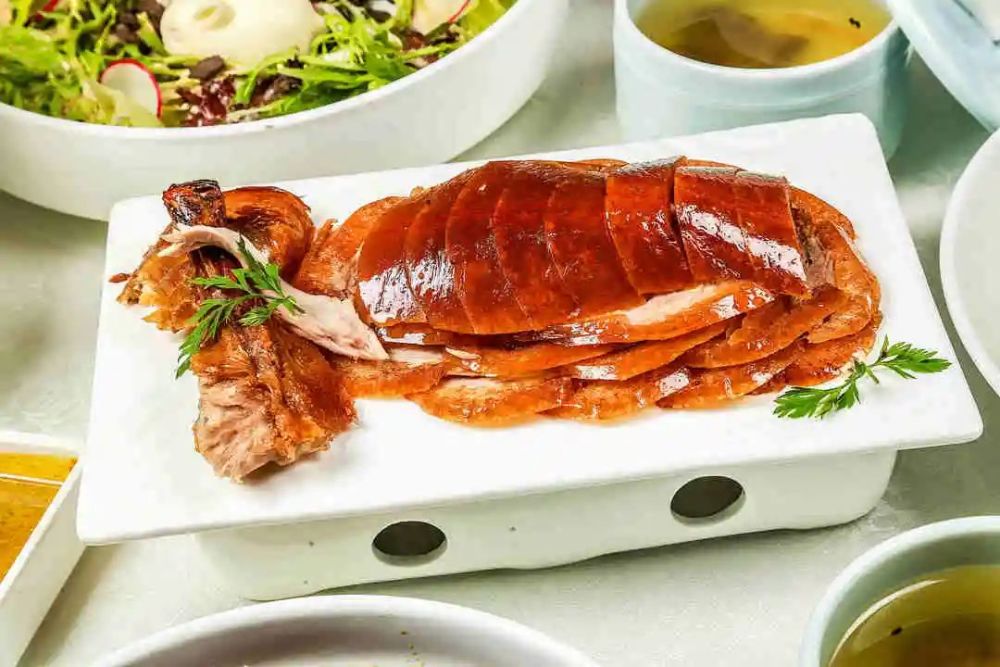 房山美食优惠1499元享便宜坊23人餐精品烤鸭半套菜饼小料乾隆白菜蕃茄