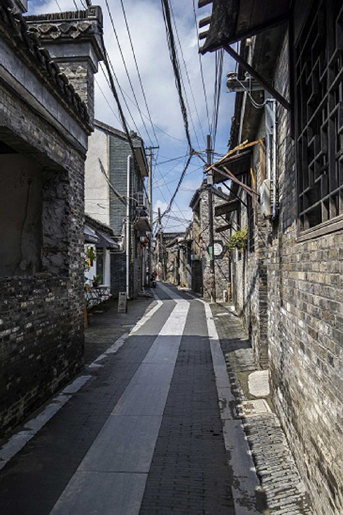 这位"老顽童",16年拍了300多条扬州小巷