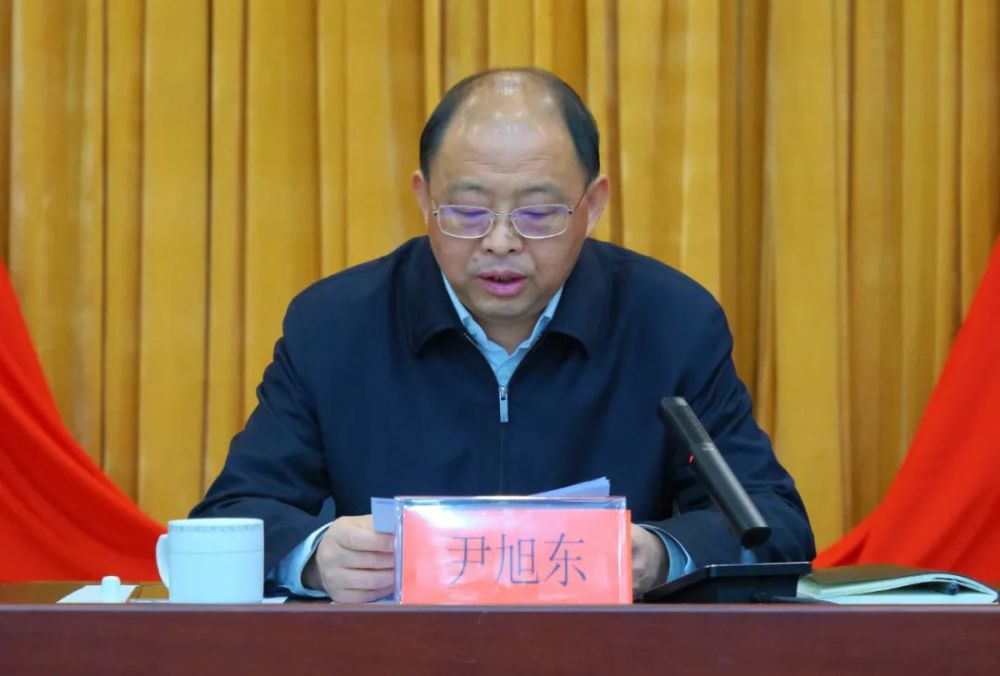 部部长李晓云,区委常委,区委统战部部长潘劲分别总结了2021年全区组织