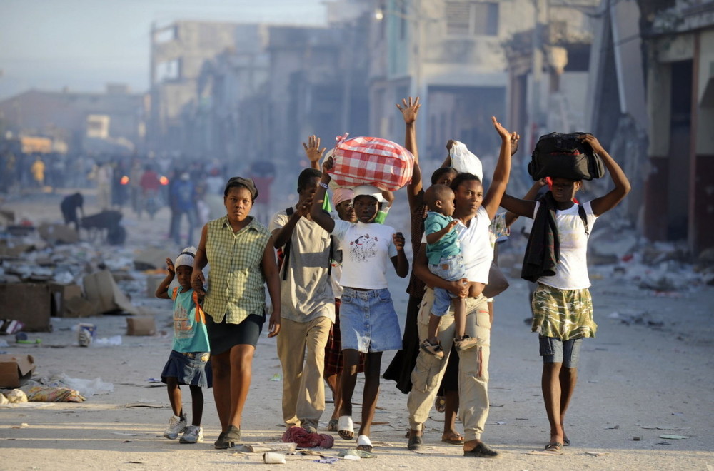 只可怜那些背井离乡的海地人,从此难见父母妻儿.