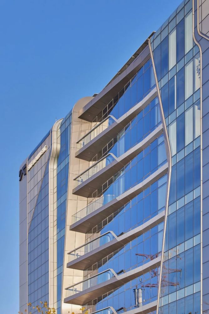 韩国yg娱乐总部大楼——特色的"混凝土"外观与极简现代的室内空间