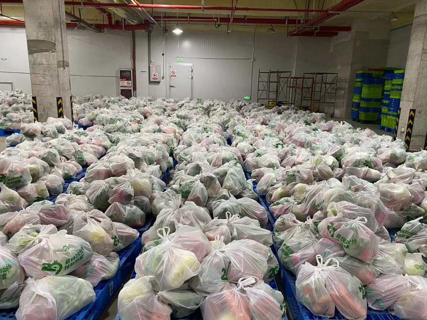 沪江桥批发市场调拨中心启用已送出785吨无接触应急蔬菜