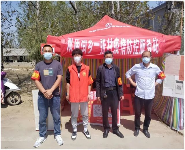 泌阳县双庙街乡干群携手共筑抗疫"钢铁长城"