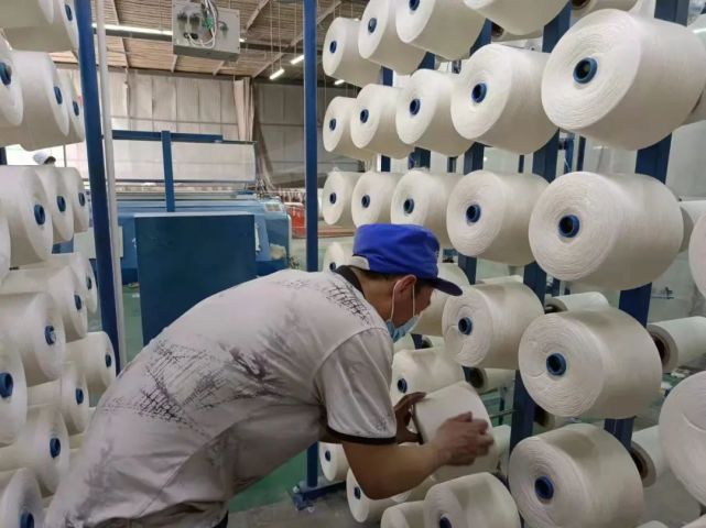 勇于担当的整经上纱工刘玉升