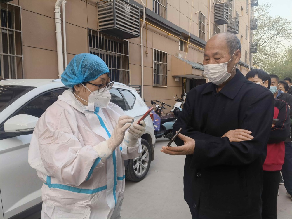 临潼区党员下沉社区网格化精准防疫