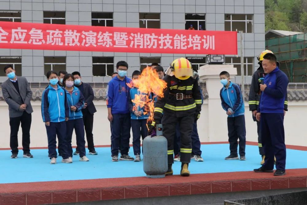消防安全进校园水洛中学举行消防安全应急疏散演练暨消防技能培训活动